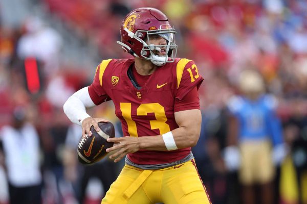 Caleb Williams Participates in Workout with Promising Wide Receiver Prospect LOS ANGELES, CALIFORNIA - NOVEMBER 18: Caleb Williams #13 of the USC Trojans passes the ball during the first half of a game against the UCLA Bruins at United Airlines Field at the Los Angeles Memorial Coliseum on November 18, 2023 in Los Angeles, California.
