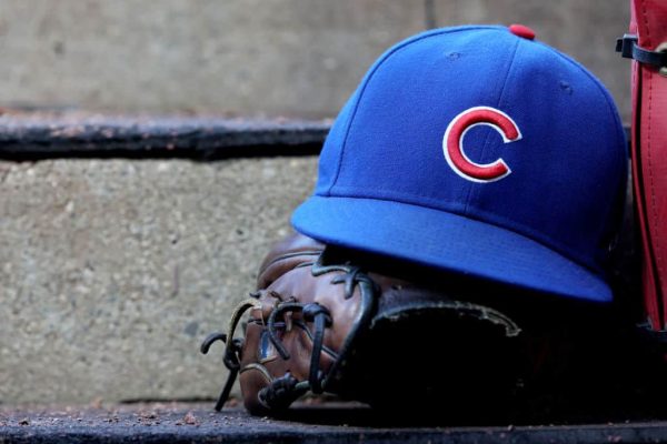 A hat and glove of a Chicago Cubs player in the dugout during the game against the Cincinnati Reds at Great American Ball Park on September 02, 2023 in Cincinnati, Ohio.