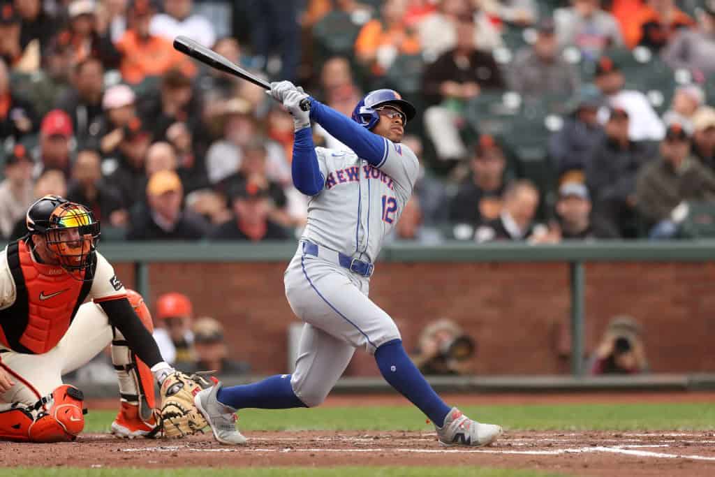 Francisco Lindor #12 of the New York Mets hits a two-run home run against the San Francisco Giants in the third inning at Oracle Park on April 24, 2024 in San Francisco, California.
