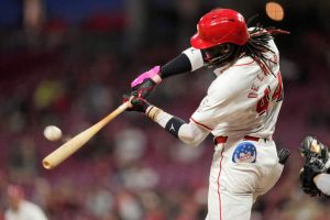 Elly De La Cruz #44 of the Cincinnati Reds hits a two-run home run during the fifth inning of a baseball game against the Philadelphia Phillies at Great American Ball Park on April 23, 2024 in Cincinnati, Ohio.