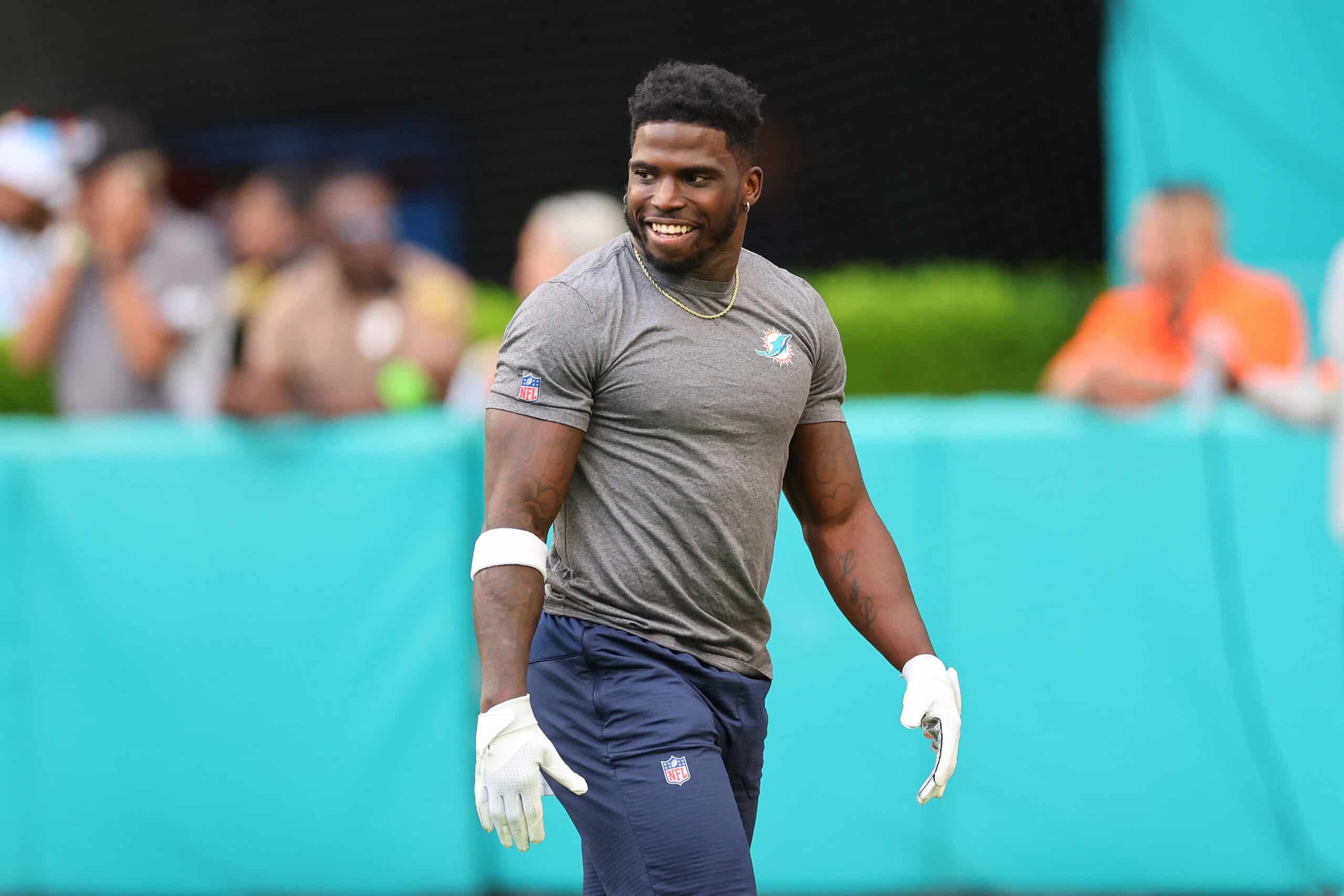 MIAMI GARDENS, FLORIDA - DECEMBER 24: Tyreek Hill #10 of the Miami Dolphins participates in warmups prior to a game against the Dallas Cowboys at Hard Rock Stadium on December 24, 2023 in Miami Gardens, Florida. The Dolphins defeated the Cowboys 22-20.