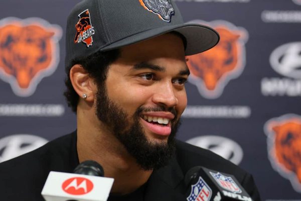 Caleb Williams #18 of the Chicago Bears speaks answers a question from the media during his introductory press conference at Halas Hall on April 26, 2024 in Lake Forest, Illinois. Caleb Williams was drafted first overall in the 2024 NFL Draft on Thursday.