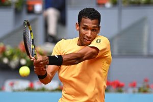 Félix races into round of 16 of Madrid as Mensik retires due to injury