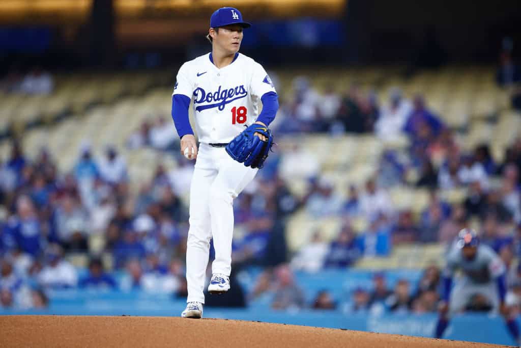 Yoshinobu Yamamoto #18 of the Los Angeles Dodgers at Dodger Stadium on April 19, 2024 in Los Angeles, California.