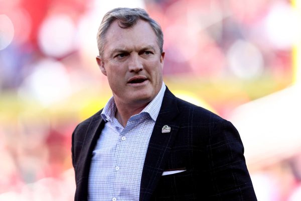 General Manager John Lynch of the San Francisco 49ers looks on prior to a game against the Dallas Cowboys in the NFC Divisional Playoff game at Levi