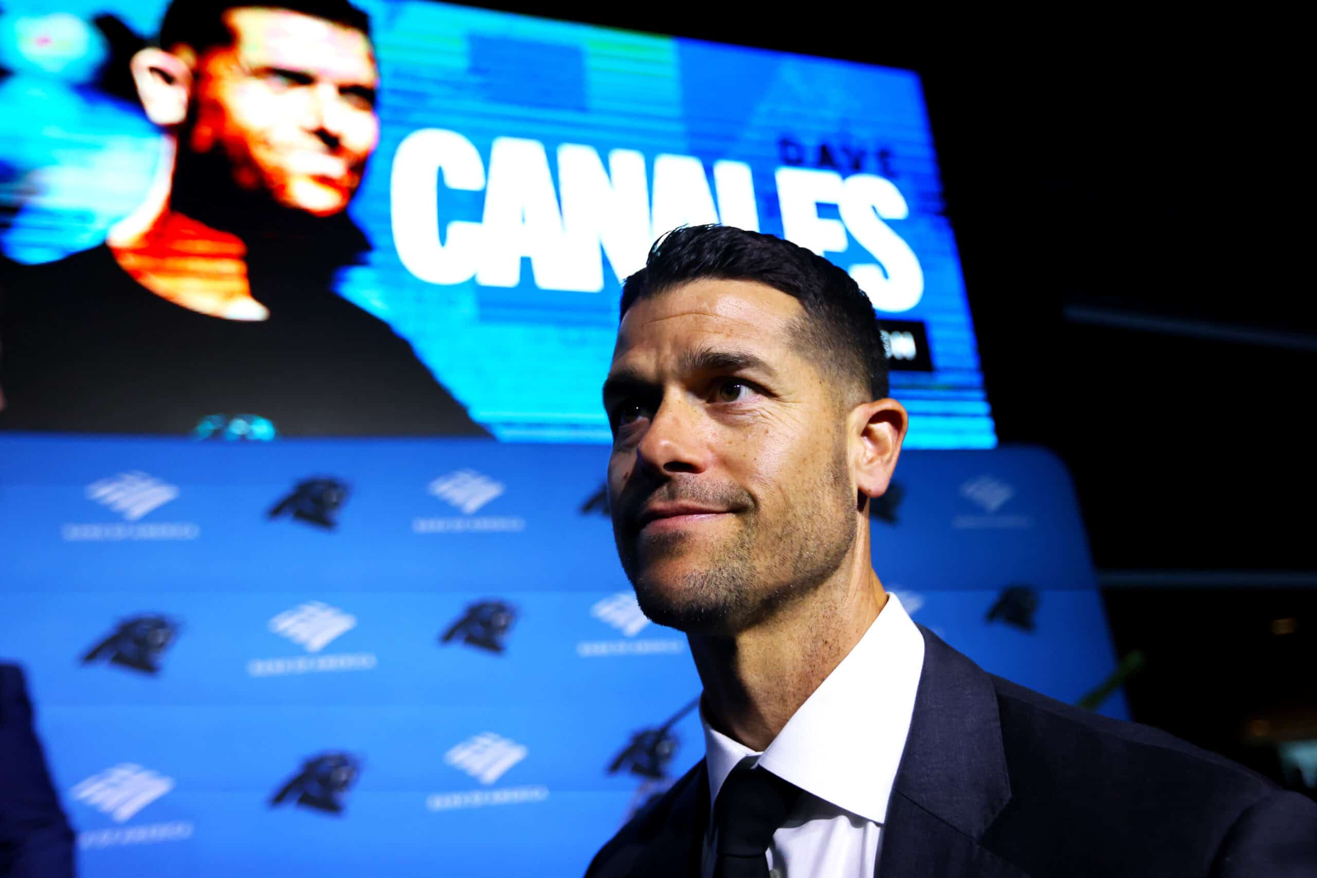CHARLOTTE, NORTH CAROLINA - FEBRUARY 01: Carolina Panthers Head Coach Dave Canales looks on after speaking to media as the Carolina Panthers introduce Canales as their new Head Coach at Bank of America Stadium on February 01, 2024 in Charlotte, North Carolina.