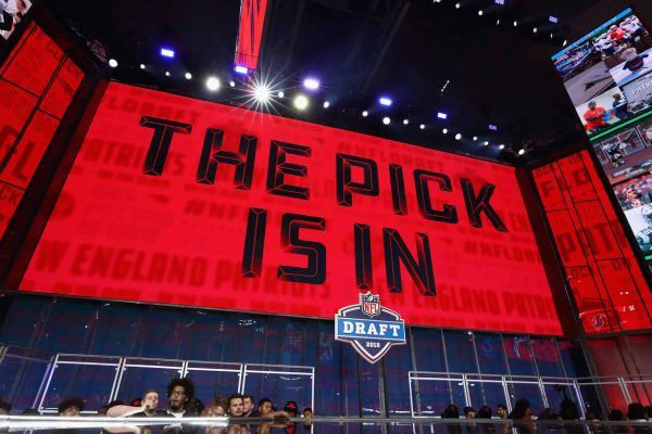 ARLINGTON, TX - APRIL 26: A video board displays the text "THE PICK IS IN" for the New England Patriots during the first round of the 2018 NFL Draft at AT&T Stadium on April 26, 2018 in Arlington, Texas.