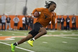 Wide receiver Adonai Mitchell goes through drills at Texas Longhorns Football Pro Day.