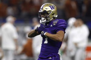 NEW ORLEANS, LOUISIANA - JANUARY 01: Rome Odunze #1 of the Washington Huskies reacts during the first half against the Texas Longhorns during the CFP Semifinal Allstate Sugar Bowl at Caesars Superdome on January 01, 2024 in New Orleans, Louisiana.