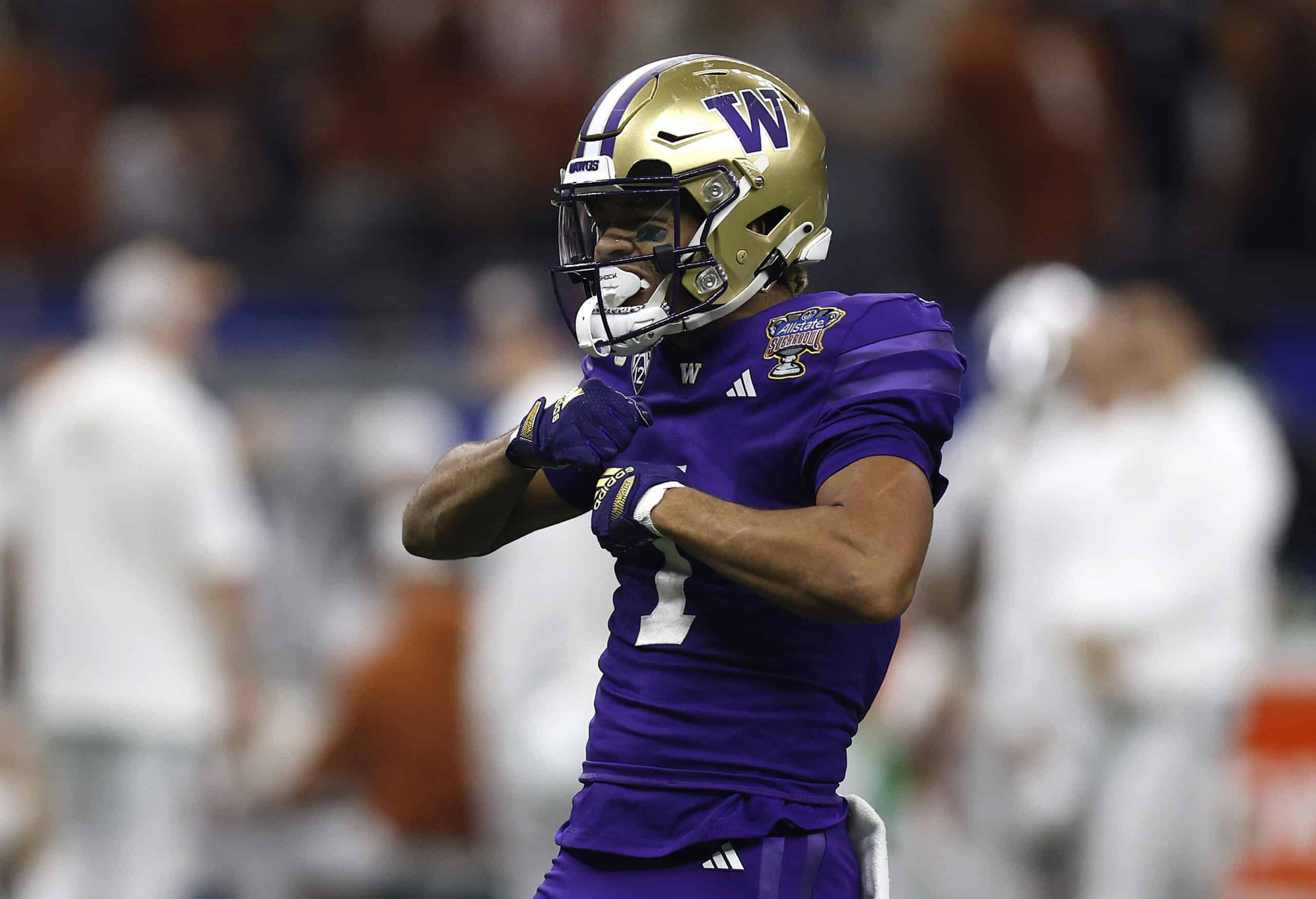 NEW ORLEANS, LOUISIANA - JANUARY 01: Rome Odunze #1 of the Washington Huskies reacts during the first half against the Texas Longhorns during the CFP Semifinal Allstate Sugar Bowl at Caesars Superdome on January 01, 2024 in New Orleans, Louisiana.