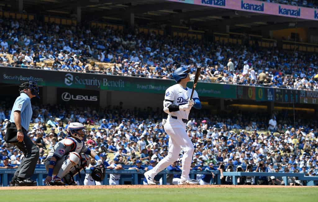 Shohei Ohtani #17 Los Angeles Dodgers hits his 176th career homer run, a two run shot to score Lux, against pitcher Adrian Houser #35 of the New York Mets during the third inning at Dodger Stadium on April 21, 2024 in Los Angeles, California. Ohtani