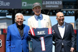 New England Patriots owner (L) Robert Kraft and president Jonathan Kraft (R) introduce the team