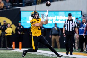 Iowa Hawkeyes DB Cooper DeJean (3) catches a punt.