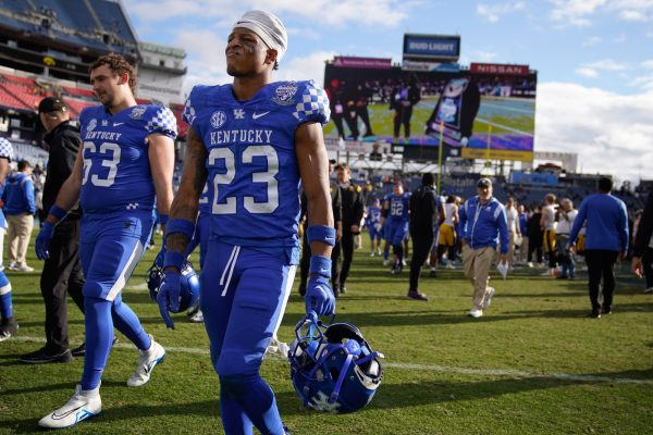 Kentucky Wildcasts DB Andru Phillips (23) leaves the field after a game against Iowa.