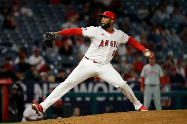 Relief pitcher Amir Garrett #32 of the Los Angeles Angels throws against the Philadelphia Phillies during the ninth inning at Angel Stadium of Anaheim on April 30, 2024 in Anaheim, California.