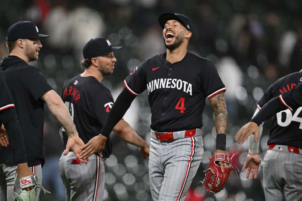 Carlos Correa #4 of the Minnesota Twins celebrate the 6-5 win against the Chicago White Sox at Guaranteed Rate Field on April 30, 2024 in Chicago, Illinois.