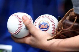 A fan waits for signatures before the game between the New York Mets and the Atlanta Braves at Citi Field on May 03, 2022 in the Flushing neighborhood of the Queens borough of New York City.