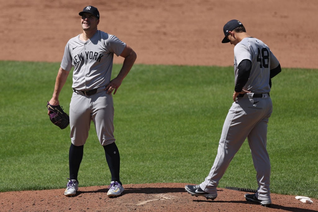 Starting pitcher Carlos Rodón #55 of the New York Yankees reacts before being relieved during the fifth inning against the Baltimore Orioles at Oriole Park at Camden Yards on May 2, 2024 in Baltimore, Maryland.