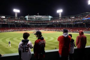 MLB fans watch batting practice before the Boston Red Sox play the Houston Astros in Game Three of the American League Championship Series at Fenway Park on October 18, 2021 in Boston, Massachusetts.