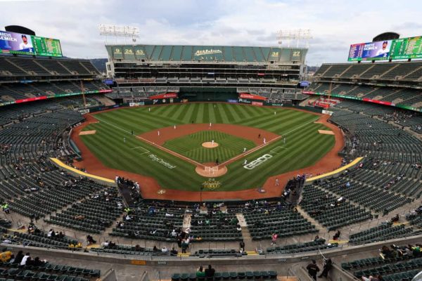 The Oakland Athletics play the Texas Rangers at a nearly empty RingCentral Coliseum on May 26, 2022 in Oakland, California. Attendance at Oakland Athletics baseball games have dwindled to historic lows as the team has traded away fan favorite players and continues to explore moving the team to Las Vegas if they can