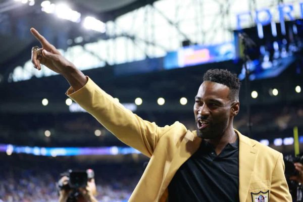 Calvin Johnson of the Detroit Lions is honored with a Hall of Fame ring during a ceremony at halftime between the Baltimore Ravens and the Detroit Lions at Ford Field on September 26, 2021 in Detroit, Michigan.