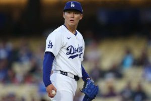 Yoshinobu Yamamoto #18 of the Los Angeles Dodgers reacts on the mound during the first inning against the Miami Marlins at Dodger Stadium on May 07, 2024 in Los Angeles, California.