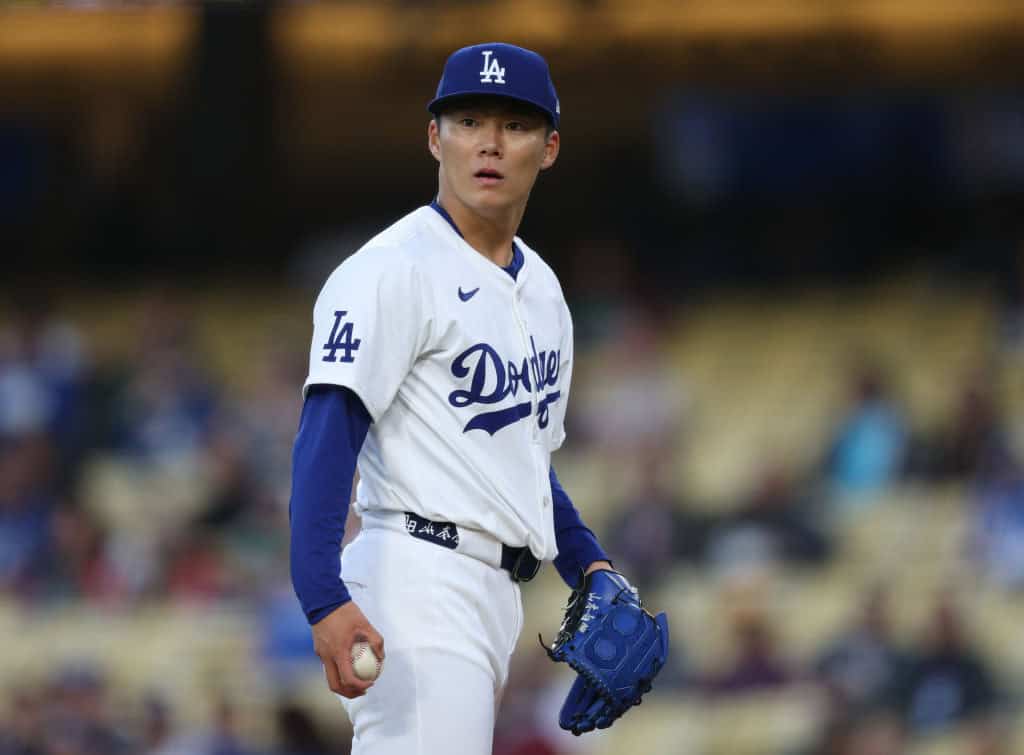 Yoshinobu Yamamoto #18 of the Los Angeles Dodgers reacts on the mound during the first inning against the Miami Marlins at Dodger Stadium on May 07, 2024 in Los Angeles, California.