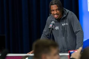 Jayden Daniels #QB01 of the LSU Tigers speaks to the media during the 2024 NFL Draft Combine at Lucas Oil Stadium on March 01, 2024 in Indianapolis, Indiana.