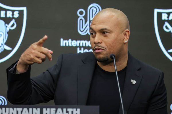 Antonio Pierce speaks as he is introduced as the head coach of the Las Vegas Raiders during a news conference also introducing Tom Telesco as the team