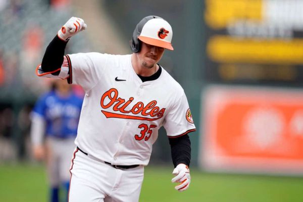 Adley Rutschman #35 of the Baltimore Orioles celebrates a walk off two run home run in the ninth inning during a baseball game against the Toronto Blue Jays at Oriole Park at Camden Yards on May 15, 2024 in Baltimore, Maryland.