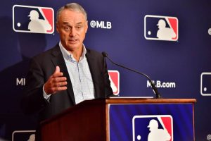 Major League Baseball Commissioner Rob Manfred answers questions during an MLB owner