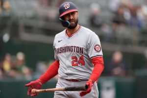 Joey Gallo #24 of the Washington Nationals looks on walking back to the dugout after he was called out on strikes against the Oakland Athletics in the top of the si inning on April 13, 2024 at the Oakland Coliseum in Oakland, California.