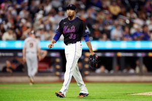 Edwin Díaz #39 of the New York Mets reacts after pitching d during the seventh inning against the San Francisco Giants at Citi Field on May 24, 2024 in the Queens borough of New York City.
