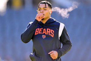 Justin Fields #1 of the Chicago Bears warms up before the game against the Green Bay Packers at Soldier Field on December 04, 2022 in Chicago, Illinois.