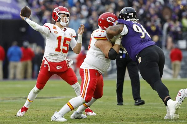 Kansas City Chiefs QB Patrick Mahomes (15) throws a pass against the Baltimore Ravens.