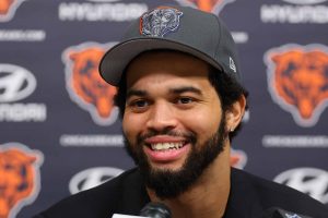LAKE FOREST, ILLINOIS - APRIL 26: Caleb Williams #18 of the Chicago Bears speaks answers a question from the media during his introductory press conference at Halas Hall on April 26, 2024 in Lake Forest, Illinois. Caleb Williams was drafted first overall in the 2024 NFL Draft on Thursday.