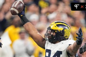 Michigan Wolverines DT Kris Jenkins (94) celebrates a fumble recovery.