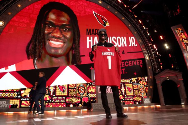 DETROIT, MICHIGAN - APRIL 25: Marvin Harrison Jr. celebrates after being selected fourth overall by the Arizona Cardinals during the first round of the 2024 NFL Draft at Campus Martius Park and Hart Plaza on April 25, 2024 in Detroit, Michigan.