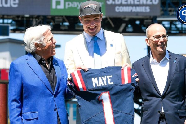 New England Patriots owner (L) Robert Kraft and president Jonathan Kraft (R) introduce the team