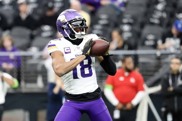 LAS VEGAS, NEVADA - DECEMBER 10: Justin Jefferson #18 of the Minnesota Vikings warms up before the game against the Las Vegas Raiders at Allegiant Stadium on December 10, 2023 in Las Vegas, Nevada.