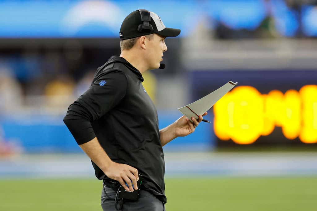 Offensive coordinator Kellen Moore of the Los Angeles Chargers looks on from the sideline in the second quarter against the Buffalo Bills at SoFi Stadium on December 23, 2023 in Inglewood, California.