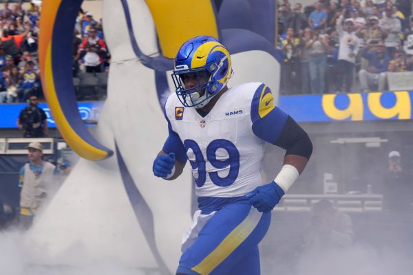 Les Snead, General Manager of the Rams, Discusses Potential Playoff Return with Aaron Donald Los Angeles Rams defensive tackle Aaron Donald (99) enters the field before the game against the Cleveland Browns at SoFi Stadium. Mandatory Credit: Kirby Lee-USA TODAY Sports
