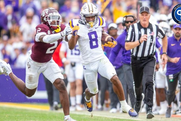 Malik Nabers running the ball as the LSU Tigers take on Texas A&M in Tiger Stadium in Baton Rouge, Louisiana, November 25, 2023.