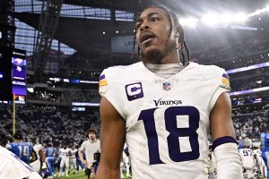 MINNEAPOLIS, MINNESOTA - DECEMBER 24: Justin Jefferson #18 of the Minnesota Vikings reacts after the team