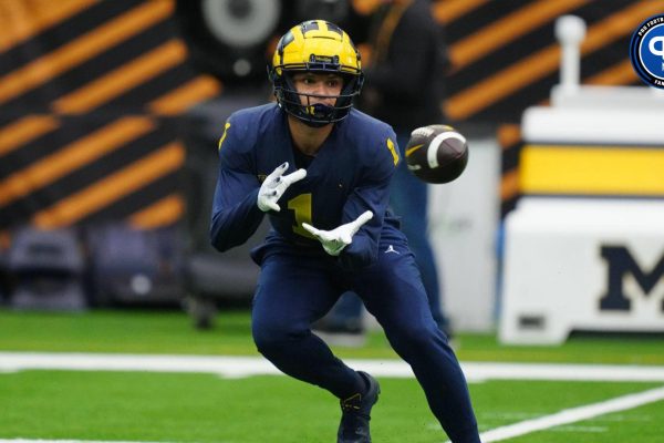 Michigan Wolverines wide receiver Roman Wilson (1) catches the ball during a practice session before the College Football Playoff national championship game against the Washington Huskies at NRG Stadium.
