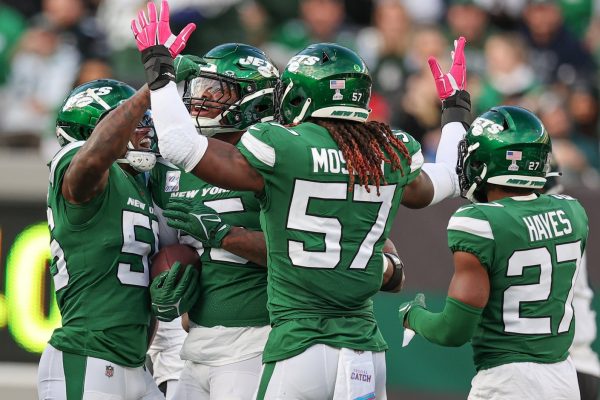 New York Jets defensive tackle Quinnen Williams (95) celebrates with teammates after recovering a fumble during the first half against the Philadelphia Eagles at MetLife Stadium. Mandatory Credit: Vincent Carchietta-USA TODAY Sports