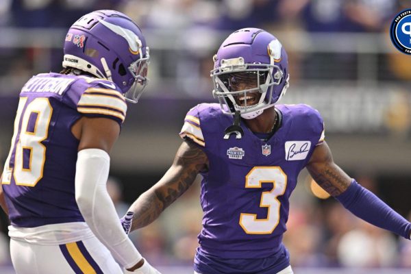 Minnesota Vikings wide receiver Jordan Addison (3) reacts with wide receiver Justin Jefferson (18) after scoring his first career touchdown pass from quarterback Kirk Cousins (not pictured) against the Tampa Bay Buccaneers during the second quarter at U.S. Bank Stadium.