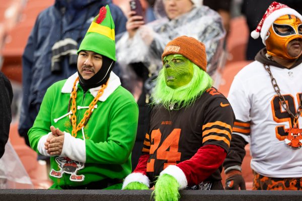 Cleveland Browns fans wear Christmas costumes before the game against the Chicago Bears at Cleveland Browns Stadium.