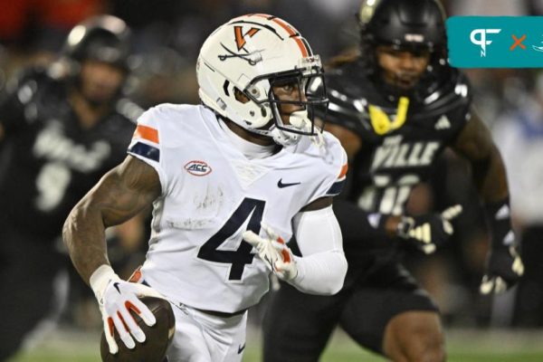 Virginia Cavaliers WR Malik Washington (4) runs the ball against the Louisville Cardinals.