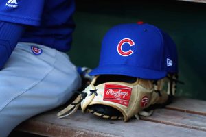 A hat and glove sit on the bench in the Chicago Cubs dugout during the Cubs game against the Washington Nationals at Nationals Park on June 26, 2017 in Washington, DC.